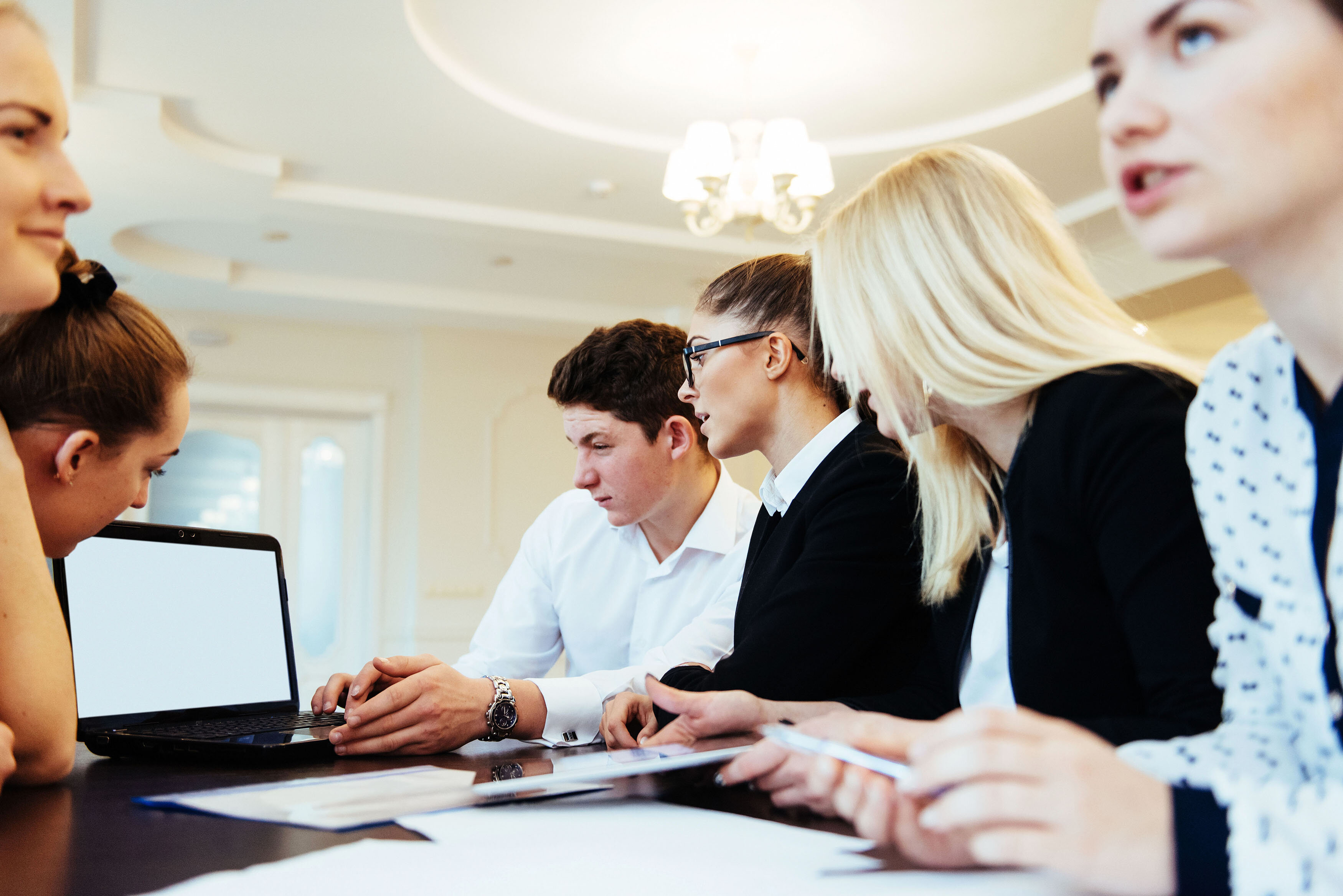 vecteezy_group-of-students-studying-using-a-laptop_6858324_311--1-